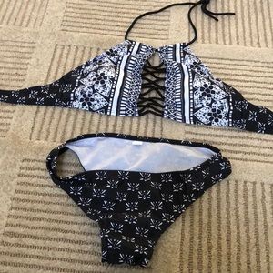Black and white bikini bathing suit. Padded. Never worn. Size small